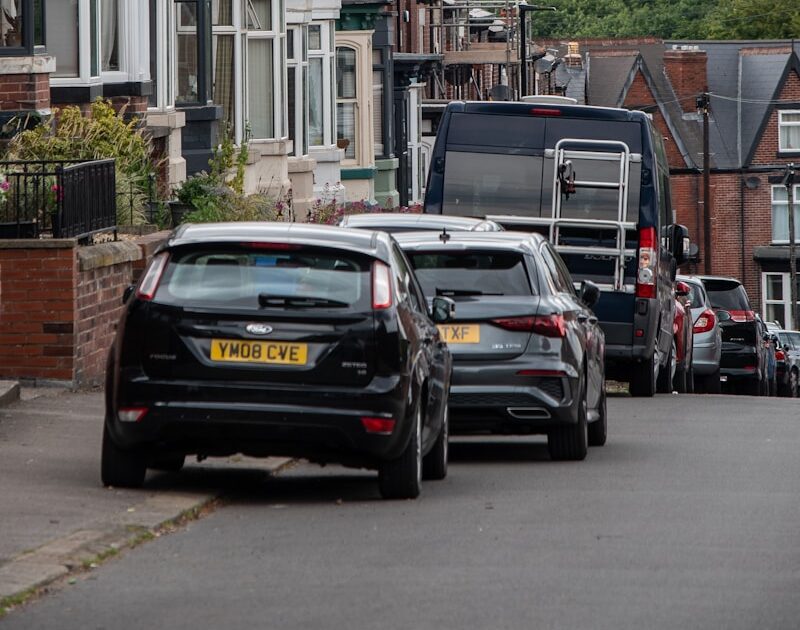 a group of cars on a street